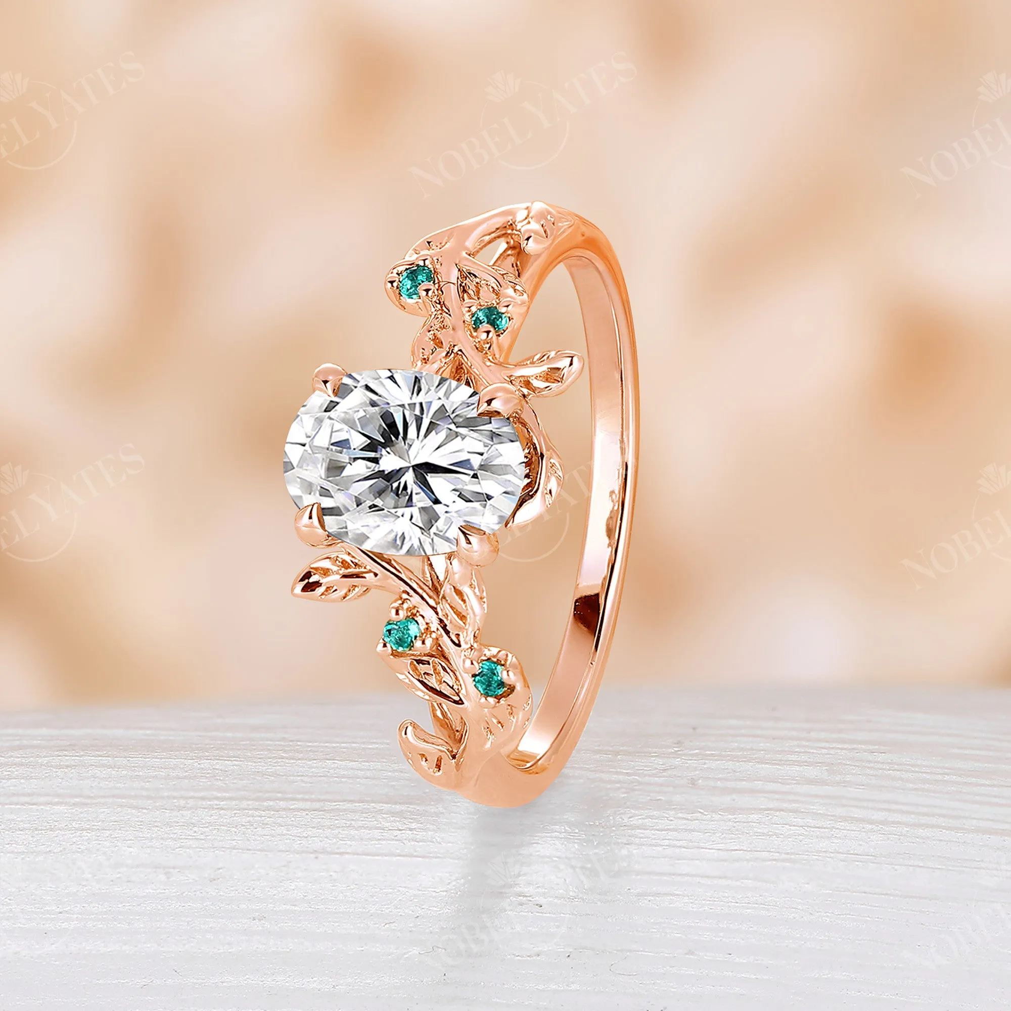 Nature Inspired Moissanite & Lab Emerald Rose Gold Leaf Engagement Ring