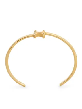 TRIOMPHE ASYMMETRIC RIGID BRACELET IN BRASS GOLD FINISH